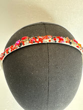 Glammed headbands. Decorated with resined flowers diamond dots and bling beads