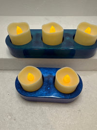 Chameleon colored resin candle holders