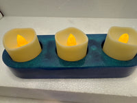 Chameleon colored resin candle holders