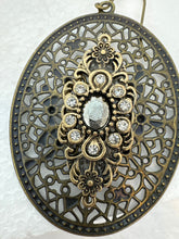 Antique bronze filigree boho chic earrings with rhinestone embellishments