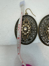 Antique bronze filigree boho chic earrings with rhinestone embellishments