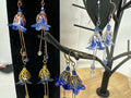 Hand painted lucite flower earring sets in varied colors