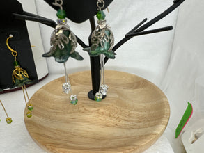 Hand painted lucite flower earring sets in varied colors