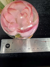 roses displayed in resin