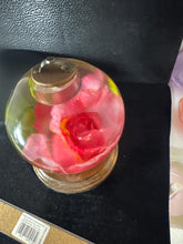 Night lights made with roses displayed in resin