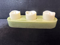 Chameleon colored resin candle holders