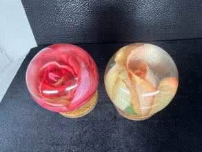 roses displayed in resin