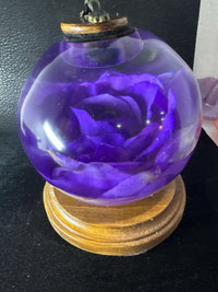 Night lights made with roses displayed in resin