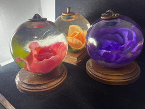 Night lights made with roses displayed in resin