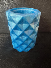resin toothbrush, makeup brush or even pencil holder. Made in creative mediums.