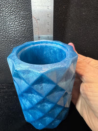 resin toothbrush, makeup brush or even pencil holder. Made in creative mediums.