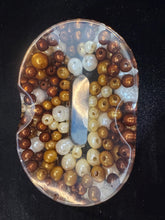 resin soap dishes of varied mediums in resin