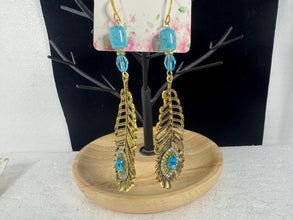Gold And Teal Blue Peacock Feather Charming Necklace