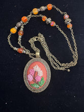 hand embroidered pendants made into beaded necklaces that can adorn any outfit