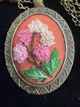 hand embroidered pendants made into beaded necklaces that can adorn any outfit