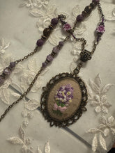 hand embroidered pendants made into beaded necklaces that can adorn any outfit
