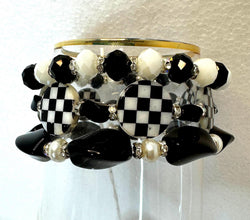 Set of 3 beaded bracelets in black and shades of white