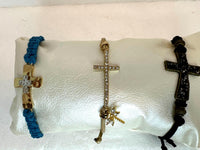 Varied cross bracelets with leather or suede string adjustable bracelets