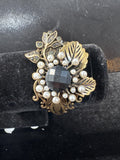 Vintage Bronze Filigree Cuff Bracelet With Rhinestone Floral Design